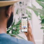 person holding silver iphone 6